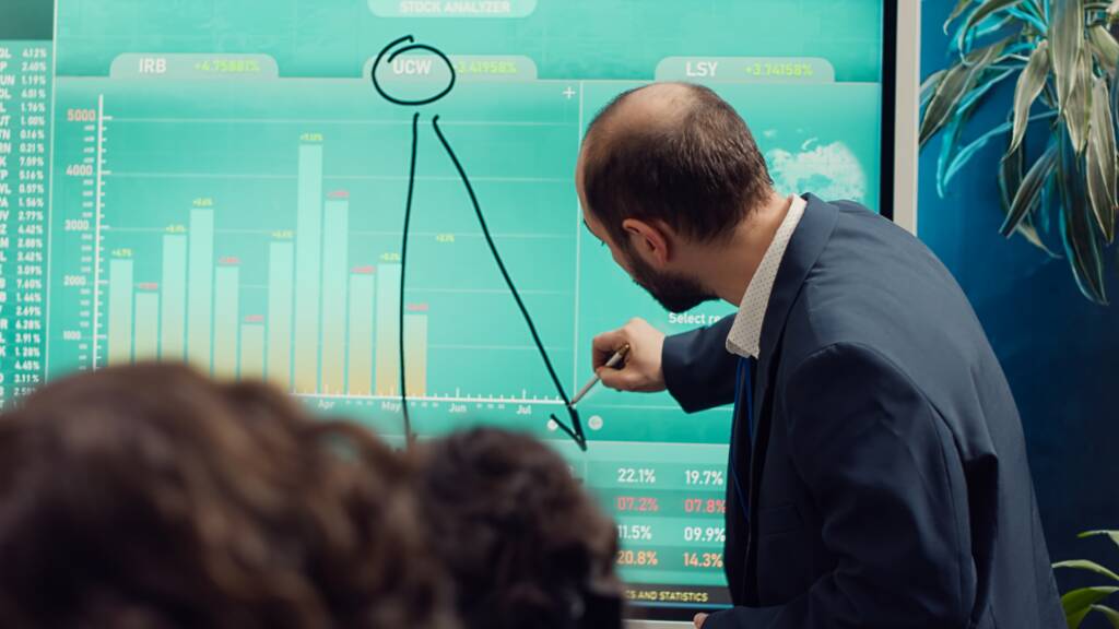 Marketing team gathering in a information sharing meeting to study updates on regulatory changes or industry standards. Business employees reviewing all data analysis reportsn